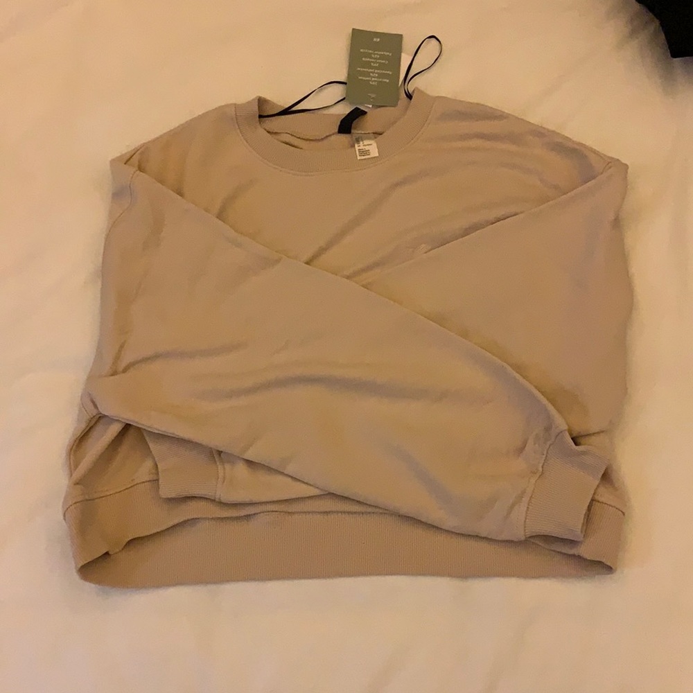 H&M pink “smile” cropped sweater